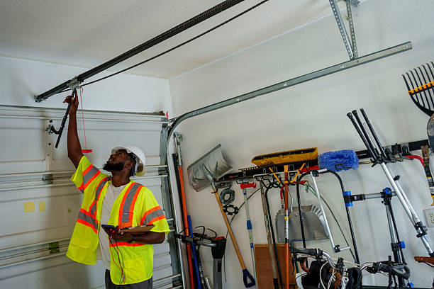 Professional Garage Door Installation technician working in Aurora, MN